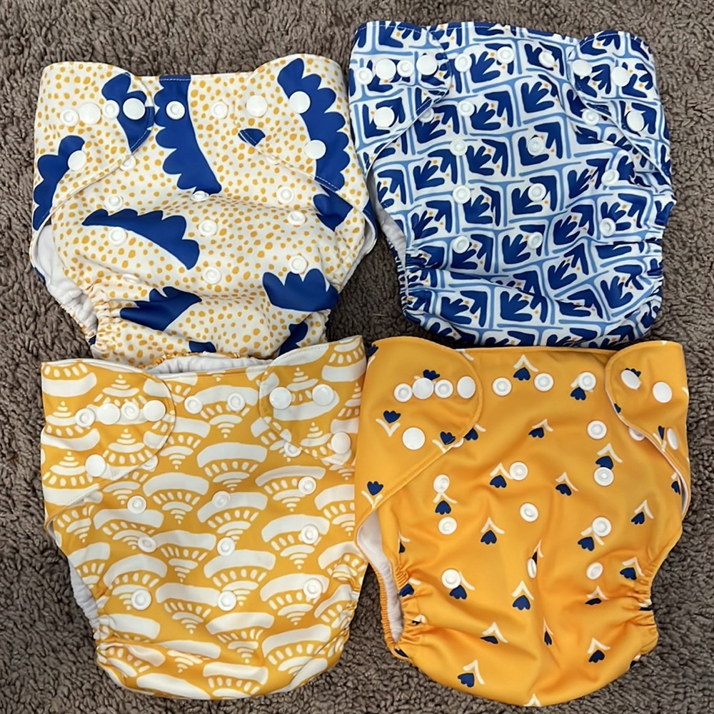 4 reusable cloth diaper covers + inserts